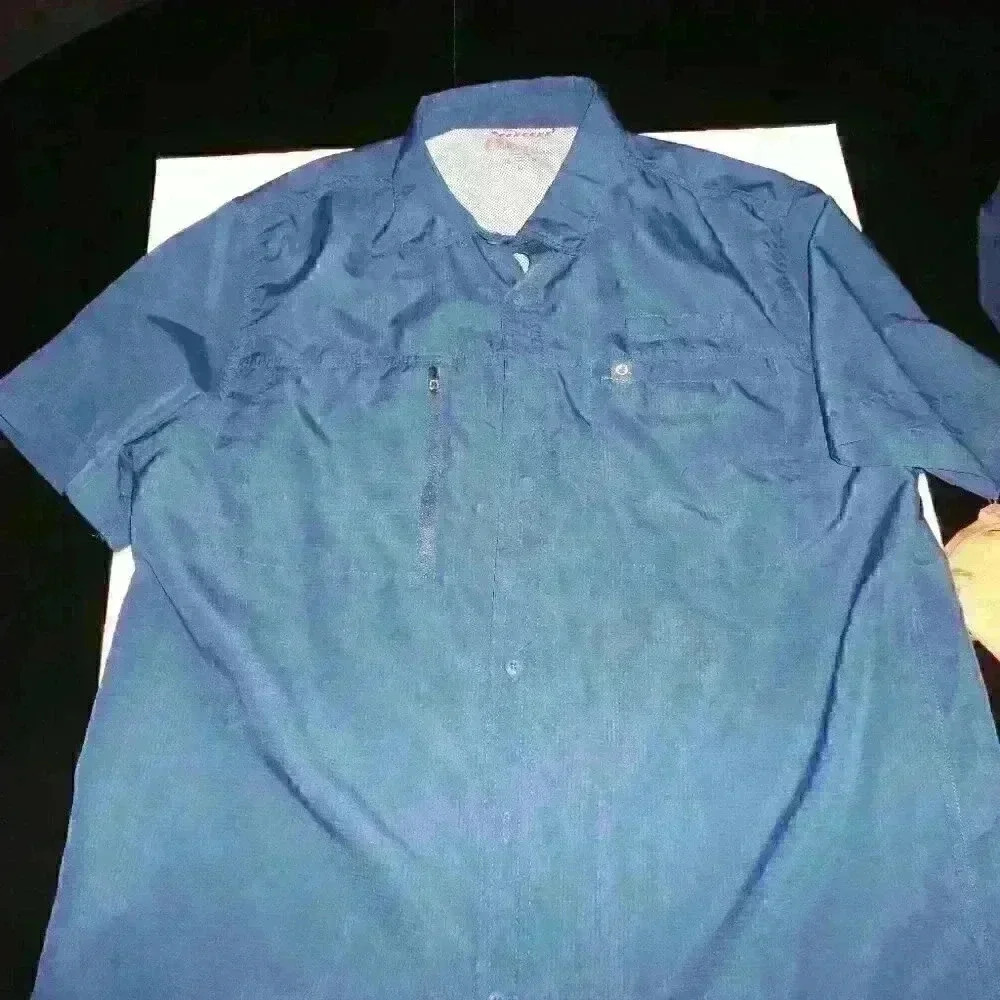 The American Outdoorsman men's blue shirt with flaps/breathable size large
